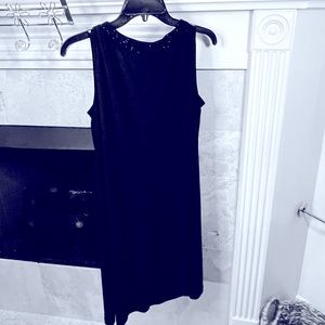 Simple little black dress with unique sheer cover.